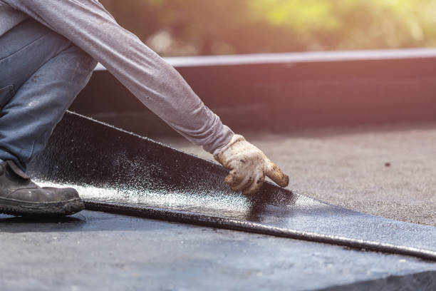 Professional Emergency Waterproofing technician working in Holton, MI